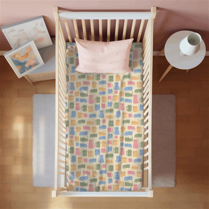 Cat print waterproof crib sheet fitted on a cot mattress