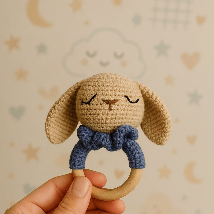 Handmade Bunny Crochet Rattle Resting on a Soft Surface