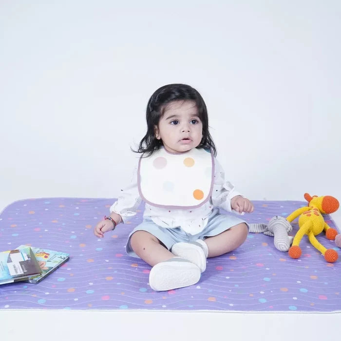 Baby Wearing Happy Matty Polka Dot Waterproof Bib During Mealtime